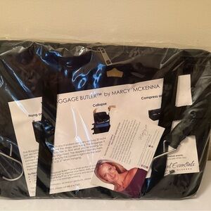 Black Luggage Butler by Marcy McKenna